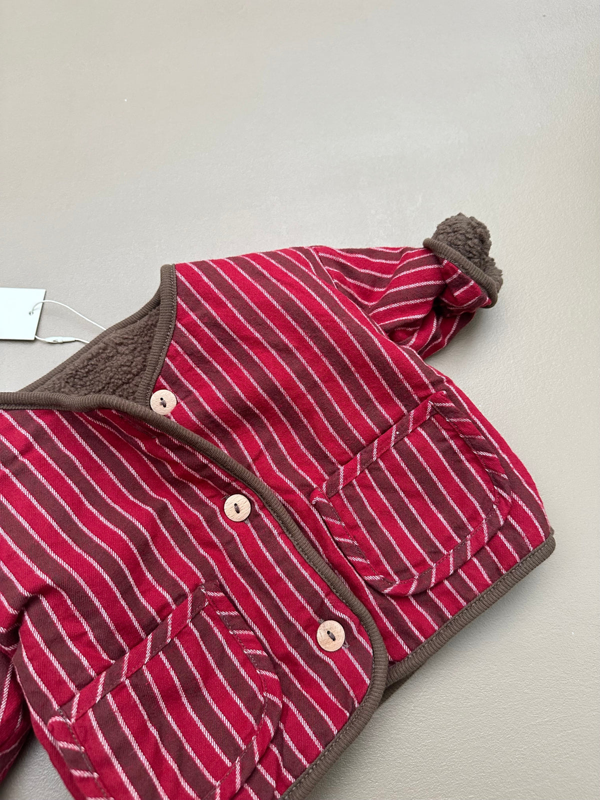 REVERSIBLE TEDDY JACKET RED STRIPES